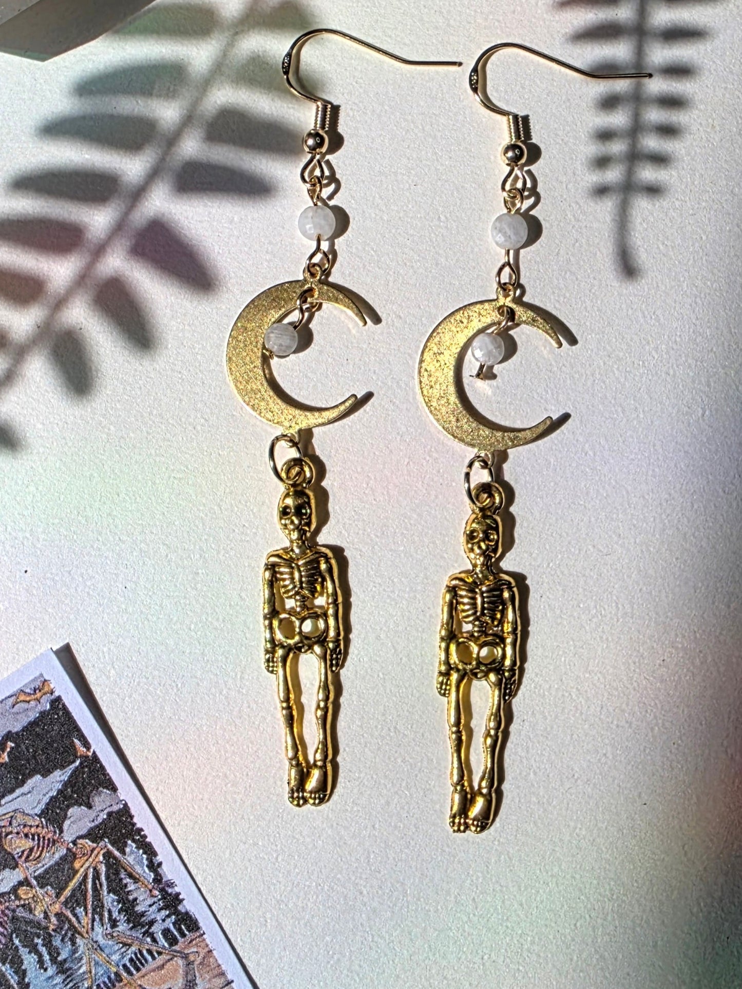 Skeletons and Crescent Moon in Moonstone Danse Macabre