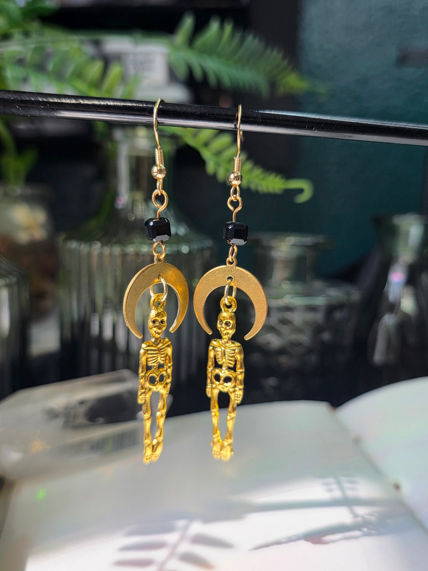 Skeletons and Downward Moon in Cubic Obsidian Danse Macabre