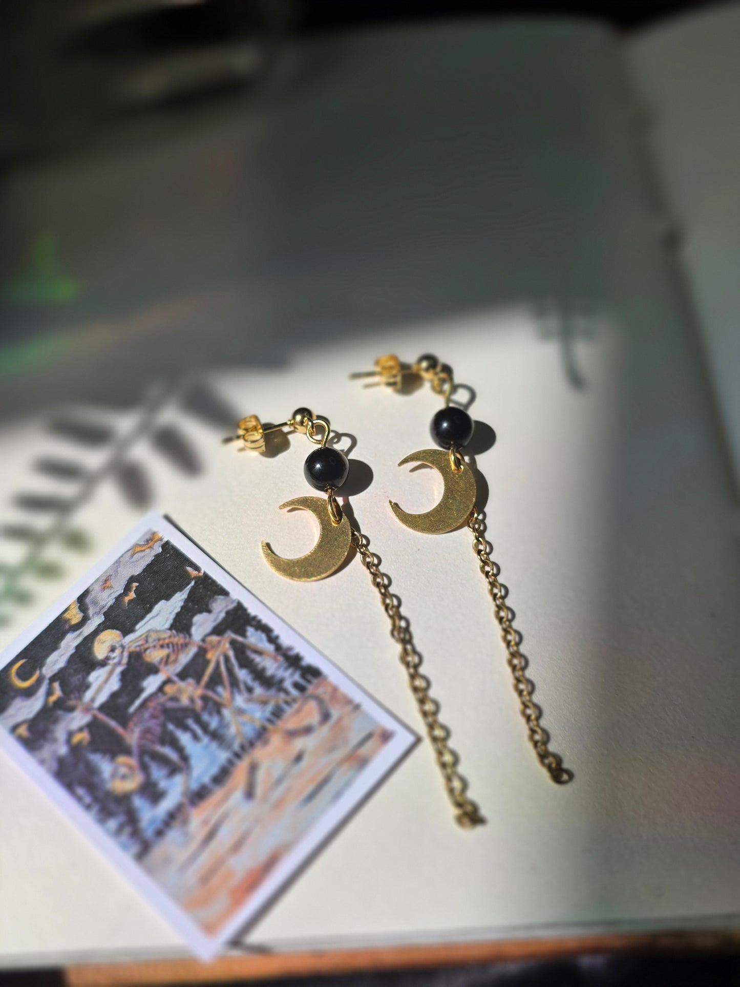 Skeletons and Crescent Moon in Golden Obsidian Chains Studs Danse Macabre