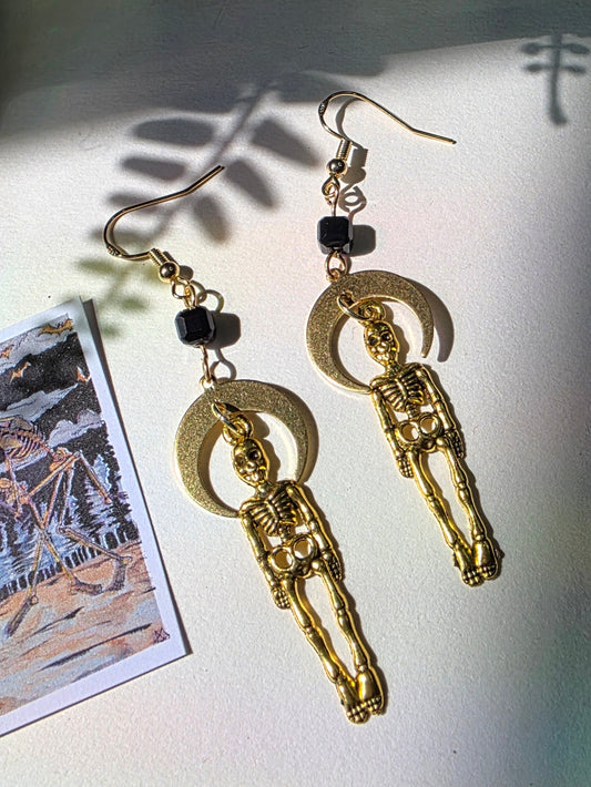 Skeletons and Downward Moon in Cubic Obsidian Danse Macabre